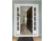 The front door opens to an entryway featuring hardwood floors and neutral paint colors at 3340 Deerwood Ln, Rex, GA 30273