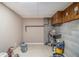 Unfinished basement space with utilities, offering potential for storage and customization at 4819 Elam Rd, Stone Mountain, GA 30083