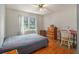 Hardwood floors in a well-lit bedroom at 4819 Elam Rd, Stone Mountain, GA 30083