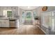 Bright breakfast nook features a bay window and tile floors near the kitchen at 4819 Elam Rd, Stone Mountain, GA 30083