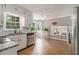 Well-lit kitchen featuring granite countertops, stainless steel appliances, and tile flooring at 4819 Elam Rd, Stone Mountain, GA 30083