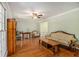 Bright living room featuring hardwood floors, ample natural light, neutral paint, and classic furnishings at 4819 Elam Rd, Stone Mountain, GA 30083