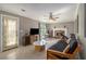 Spacious living room features a fireplace, ceiling fan and lots of natural light at 4819 Elam Rd, Stone Mountain, GA 30083