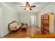 Cozy living room featuring hardwood floors, neutral wall paint, classic furniture, and ample natural light at 4819 Elam Rd, Stone Mountain, GA 30083
