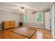 Hardwood floors, natural light, and neutral paint give this main bedroom a cozy feel with room for a large dresser at 4819 Elam Rd, Stone Mountain, GA 30083