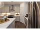 Bright updated kitchen with stainless steel appliances and spacious countertops at 1011 Crown Oak St # 47, Johns Creek, GA 30022