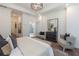 Bright, airy main bedroom with ensuite bath, sitting area, and modern lighting at 1011 Crown Oak St # 47, Johns Creek, GA 30022