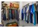 Walk-in closet with rods on both sides providing lots of storage space at 141 Ennisbrook Se Dr, Smyrna, GA 30082