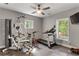 Home gym featuring exercise equipment and natural light from two large windows at 141 Ennisbrook Se Dr, Smyrna, GA 30082
