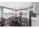 Bright kitchen with white cabinets, a center island, and modern appliances at 141 Ennisbrook Se Dr, Smyrna, GA 30082