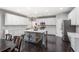 Stylish kitchen featuring white cabinets and stainless-steel appliances at 141 Ennisbrook Se Dr, Smyrna, GA 30082
