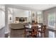 Inviting living space with fireplace, large windows, and hardwood floors at 141 Ennisbrook Se Dr, Smyrna, GA 30082