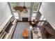 Spacious living room with high ceilings, natural light, fireplace and hardwood flooring at 141 Ennisbrook Se Dr, Smyrna, GA 30082