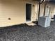Backyard area with an air conditioner and door to the interior at 3015 Liberty Nw Way, Atlanta, GA 30318