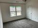Cozy bedroom with carpet and a window providing natural light at 3015 Liberty Nw Way, Atlanta, GA 30318