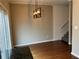 Bright dining room featuring hardwood floors and a modern chandelier at 3015 Liberty Nw Way, Atlanta, GA 30318
