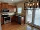 Modern kitchen with stainless steel appliances, granite countertops, and a tile backsplash at 3015 Liberty Nw Way, Atlanta, GA 30318