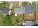 Aerial view showcasing the property's layout, including the backyard deck and surrounding landscaping at 3383 Spirit Nw Dr, Kennesaw, GA 30144