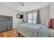 Charming bedroom with hardwood flooring, dresser and window at 3383 Spirit Nw Dr, Kennesaw, GA 30144