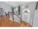 Entryway with hardwood floors, decorative lighting, and a view of the staircase at 3383 Spirit Nw Dr, Kennesaw, GA 30144