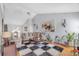 Open living room with vaulted ceilings, a cozy seating area, and stylish decor throughout at 3383 Spirit Nw Dr, Kennesaw, GA 30144