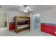 Bedroom with bunk beds and a patterned accent wall at 3871 Lake Juliette Dr, Buford, GA 30519