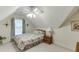 Bedroom featuring a ceiling fan and a window with curtains at 3871 Lake Juliette Dr, Buford, GA 30519