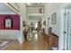 Bright foyer with hardwood floors, high ceilings, and open staircase at 3871 Lake Juliette Dr, Buford, GA 30519