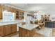 Open-concept kitchen with island and view of the living area at 3871 Lake Juliette Dr, Buford, GA 30519