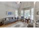 Cozy living room with vaulted ceilings and large windows at 3871 Lake Juliette Dr, Buford, GA 30519