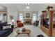 Spacious living room with stone fireplace and built-in cabinets at 3871 Lake Juliette Dr, Buford, GA 30519