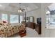 Spacious main bedroom with trey ceilings, ensuite, and walk-in closet at 3871 Lake Juliette Dr, Buford, GA 30519
