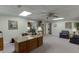 Large office space with neutral walls, carpeting, ceiling fan, and plenty of room for working and storage at 3871 Lake Juliette Dr, Buford, GA 30519