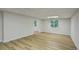 Finished basement offers extra living space with durable floors and natural light at 545 Woodman Pl, Roswell, GA 30076