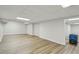 Finished basement space offers extra living area with durable floors and ample room at 545 Woodman Pl, Roswell, GA 30076