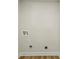 Empty laundry room with hardwood flooring at 545 Woodman Pl, Roswell, GA 30076
