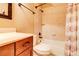 Cozy bathroom featuring a shower and bathtub combo and an ample vanity at 116 Archstone Sq, Mcdonough, GA 30253