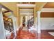 Elegant foyer featuring hardwood floors, staircase, and an open floor plan at 116 Archstone Sq, Mcdonough, GA 30253
