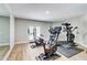 A spacious home gym featuring exercise equipment and access to the outdoors at 116 Archstone Sq, Mcdonough, GA 30253