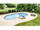 Inviting pool with hot tub and lounge area, perfect for relaxation and entertainment in a private backyard at 116 Archstone Sq, Mcdonough, GA 30253