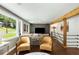 Stylish living area with a large window, hardwood floors, and a modern open concept design at 1981 Shalimar Ne Dr, Atlanta, GA 30345