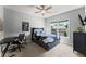 Comfortable bedroom showcasing a bed and desk at 5157 Sunlake Dr, Hoschton, GA 30548