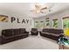 Spacious bonus room offering lots of natural light and ample seating at 5157 Sunlake Dr, Hoschton, GA 30548