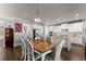 Dining area features hardwood floors and provides easy access to the adjacent kitchen at 5157 Sunlake Dr, Hoschton, GA 30548