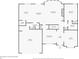 Detailed first floor plan showcasing the layout of the kitchen, living room, and bedroom at 5157 Sunlake Dr, Hoschton, GA 30548