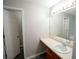 Bathroom with a large mirror and a neutral color scheme at 52 Tide Water Way, Rockmart, GA 30153
