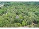 Secluded home nestled within a natural forest, located at a geocoded point, providing privacy and a sense of tranquility at 83 Shipp Cir, Hiram, GA 30141