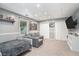 Finished basement with a cozy seating area, neutral carpet and ample closet space at 83 Shipp Cir, Hiram, GA 30141