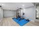 Spacious basement area with workout equipment and a fitness mat, great for staying active and healthy at home at 83 Shipp Cir, Hiram, GA 30141