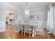 Elegant dining room with hardwood floors and a decorative chandelier at 83 Shipp Cir, Hiram, GA 30141